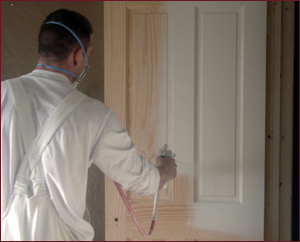 PJM Decorators painting a door